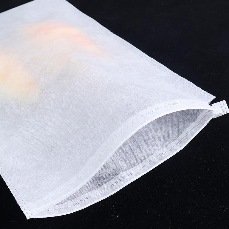 Disposable Non-Woven Drawstring Pouch Clothing Dustproof Drawstring Pouch Non-Woven Storage Bag Custom thumbnail 3