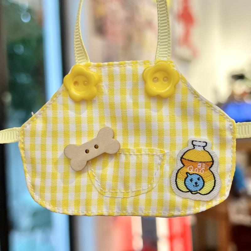 Orange juice bottle yellow plaid apron