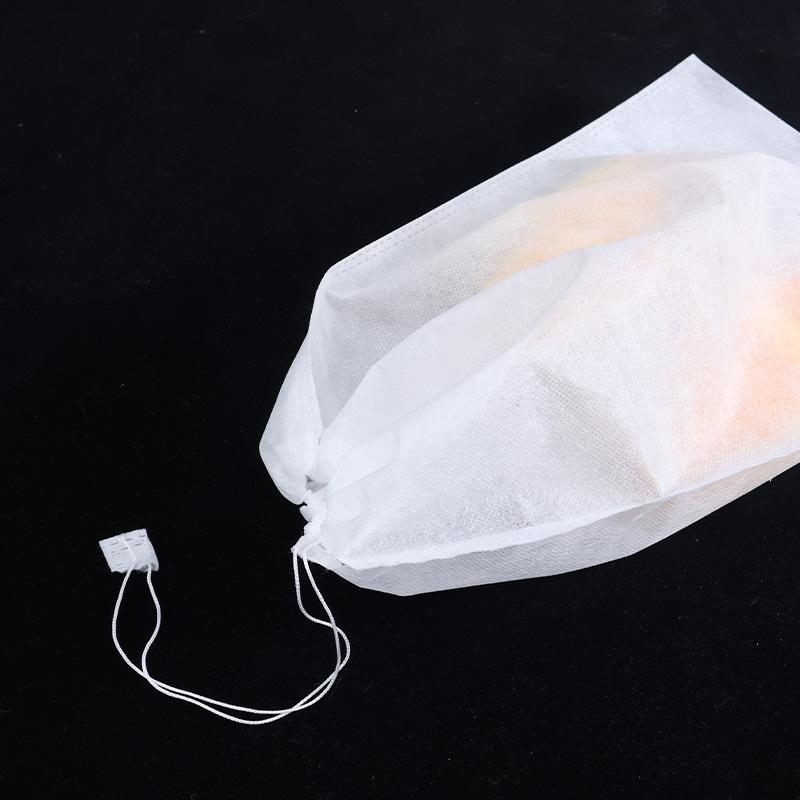 Disposable Non-Woven Drawstring Pouch Clothing Dustproof Drawstring Pouch Non-Woven Storage Bag Custom thumbnail 2