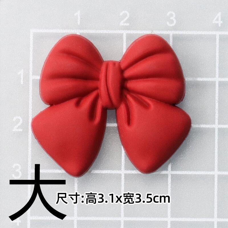 Soft rubber: red bow [3.4*3cm]]