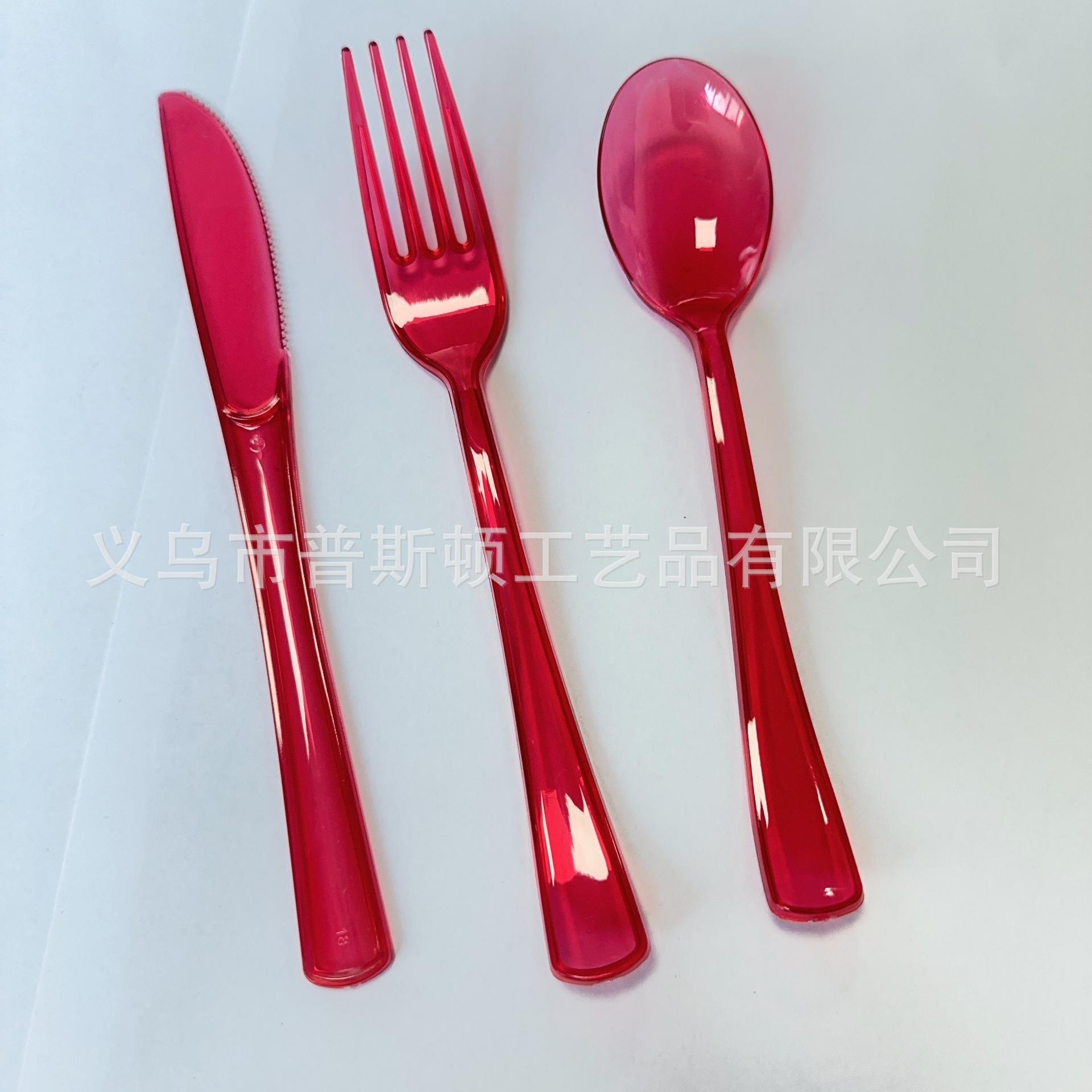 Bright red (same color as cups and plates) / Spoon