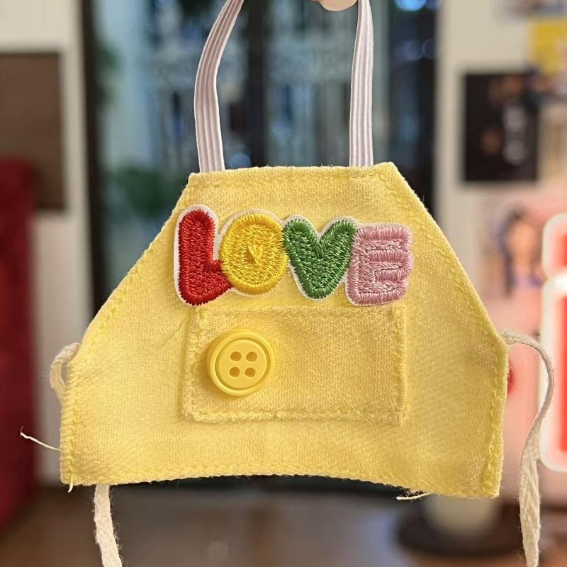 Yellow button embroidered apron