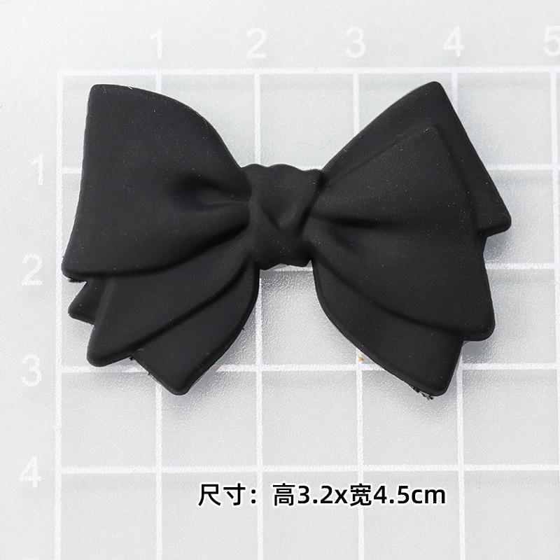 Soft glue: black bow "3.2*4.5cm]