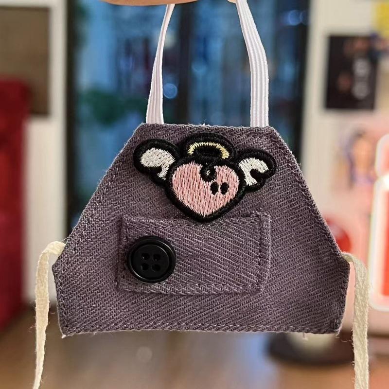 Black button embroidered apron