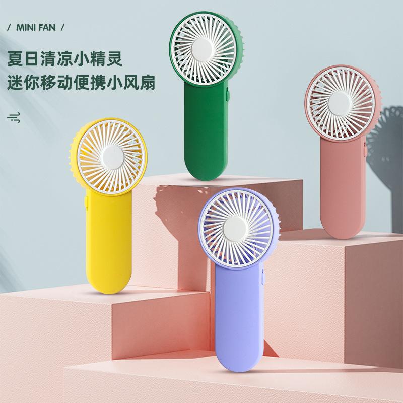 New Portable Handheld Mini Fan with Dry Battery, Suitable for Outdoor Use, Can Be Printed with Logo, Gift Item for Outdoor Use